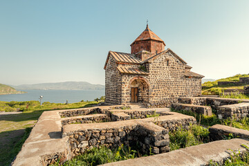 Fototapeta na wymiar Sevanavank Monastery on the shore of Lake Sevan is the main religious and tourist attraction of Armenia and entire Transcaucasia