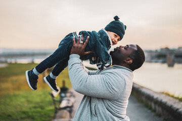 Happy father and his son enjoy spending time together outdoor. © inesbazdar