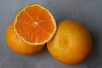 Juicy tangerines lie on the table