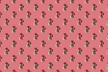 Christmas seamless pattern with snowmen on a pink surface. Winter pattern on a pastel pink background. Christmas ball snowman. Template for wallpaper, holiday packaging