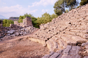 Antique amphitheatre in ancient town Phaselis in Antalya region, Turkey.