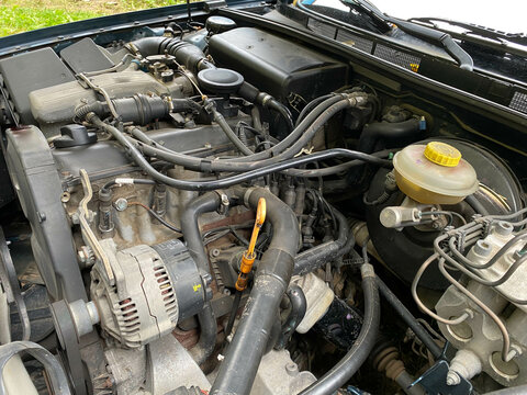 cables bitten by a marten in a car in more detail a lambda probe. gnaw marks and dirt in the engine compartment