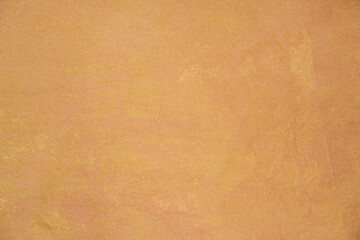 Fototapeta premium Texture de peinture jaune et dorée - peinture sur tissus - création artistique - abstrait