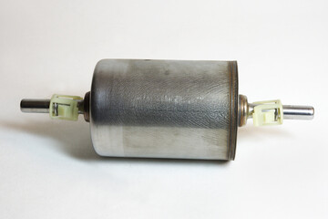 fuel filter with clips for fixing fuel lines on fittings. inline, automotive, metal housing. shadow...