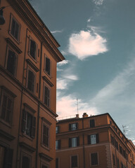 Fototapeta na wymiar Houses and roofs of the city of Rome during sunny evening