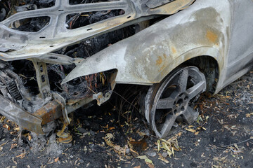 Skeleton of a burnt out car after an accident.
