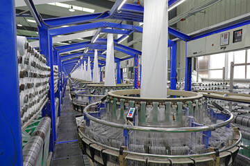 workers work hard on the textile production line, China