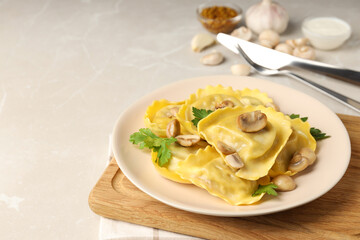 Delicious food concept with ravioli on textured table