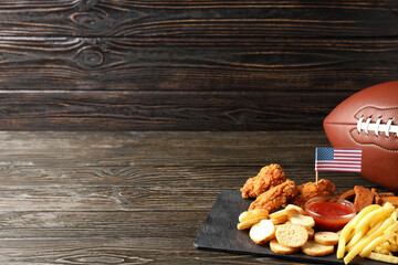 Concept of Super bowl snacks on dark table