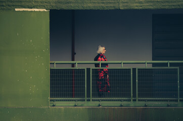 Portrait of mature woman in interior of industrial building
