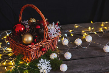 basket with christmas decor on a wooden table