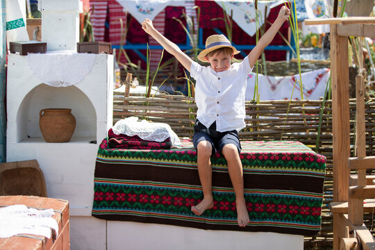 Belarusian or Ukrainian boy in an ethnic village.
