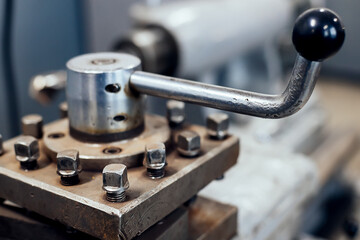 Industrial background. Metal lathe detail close-up. Part of industrial equipment for metal processing. Real scene.