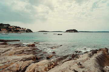 Fototapeta na wymiar Travel by Croatia. Rock seashore of Hvar island.