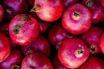 Fresh ripe pomegranates in the box