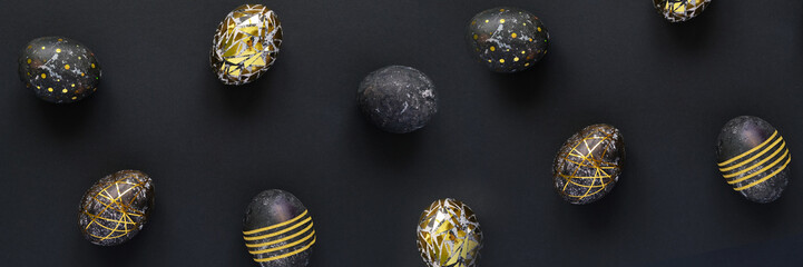 Black easter eggs with gold pattern on black