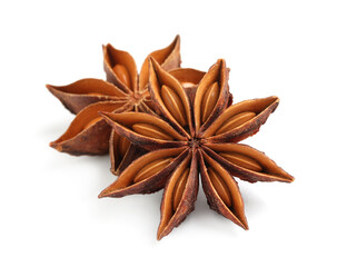 Dry anise stars with seeds on white background