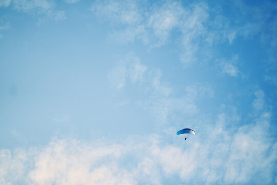 Paraplane on the blue sky background, leisure activity.