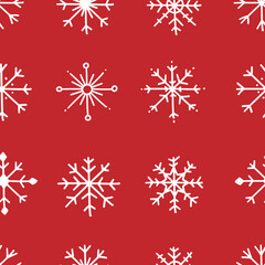 Naklejka na ściany i meble Seamless pattern with snowflakes on a red background. Winter illustration background.