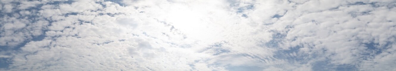 Sky panorama on a sunny day with clouds like Altocumulus in the city of Rio de Janeiro, Brazil.	