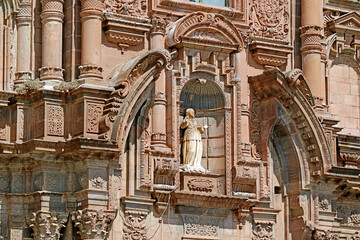 Fototapeta na wymiar Incredible Facade of Church of the Society of Jesus or Iglesia de la Compania de Jesus in Spanish Baroque Architecture Style, Historic Center of Cusco, Peru
