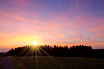 Pink Sunset sky. In the evening sky with sun.