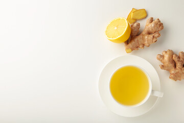 Ginger tea with lemon on white background.