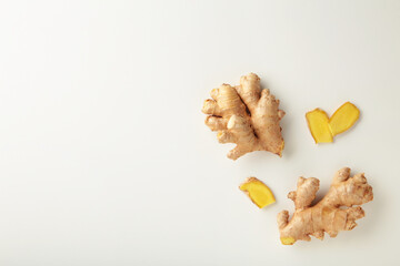 Fresh ginger with sliced on white background
