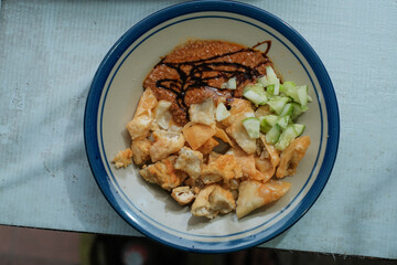Indonesian traditional food on a plate called batagor