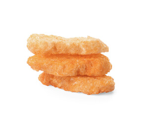 Stack of delicious crispy rusks on white background