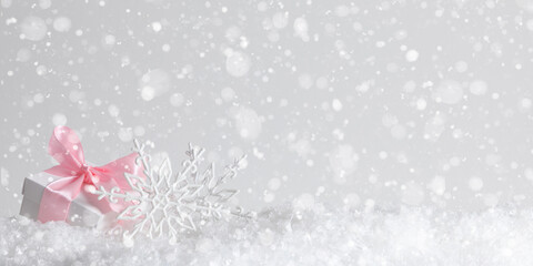 Christmas holiday composition. Christmas decor, gift, snowflake on white background. Xmas, winter, new year concept, copy space