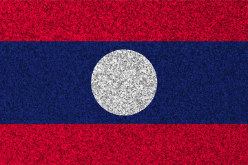 Patriotic glitter background in color of Laos flag