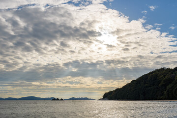 Fototapeta na wymiar Coastal scenery of the Seto Inland Sea, view toward the Kasaoka Islands from Saburoshima Beach, Yorishima Town