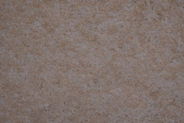 Beige ceramic granite tile. Terrace tile. The background.