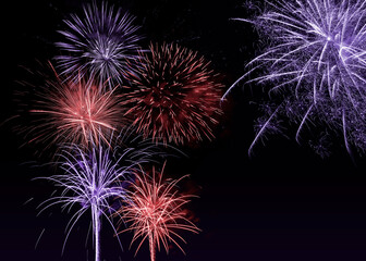 Fototapeta premium 4th of July - Independence Day of USA. Beautiful bright fireworks lighting up night sky