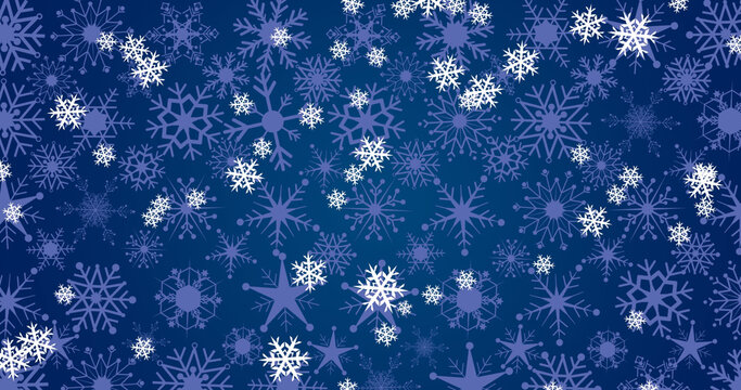 Image of snow falling at christmas on blue background