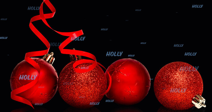 Image of holly text in repetition over christmas baubles