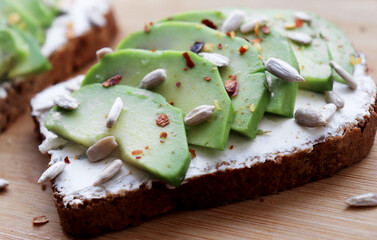 healthy sandwich with avocado and cottage cheese close-up