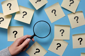 There are a lot of questions on stickers and a magnifying glass in your hands. Finding answers to...