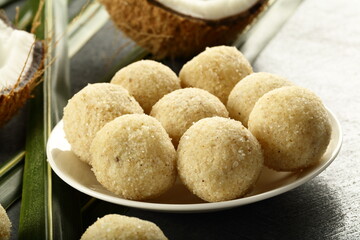 Indian traditional sweets- delicious coconut ladoo, laddu, nariyal ka moticoor - vintage recipes.