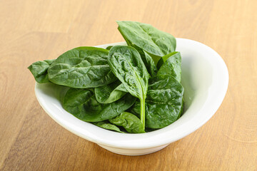 Fresh green spinach leaves in the bowl