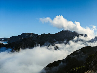 Obraz premium Walking at Pico Ruivo above the clouds in Madeira, Portugal.