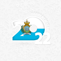 Happy New Year 2022 for San Marino on snowflake background.