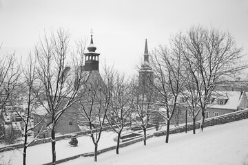 Bratislava - St. Nicholas church and Cathedral in the snowfall.