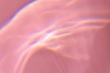 Beautiful lights and shadows of glass on pink or purple background. Overlay mode. Caustic effect of...