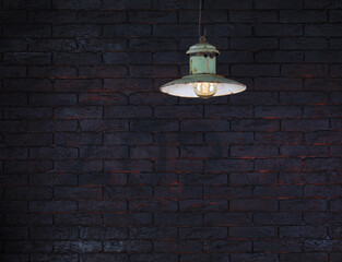 Fototapeta na wymiar vintage street lamp, black brick wall