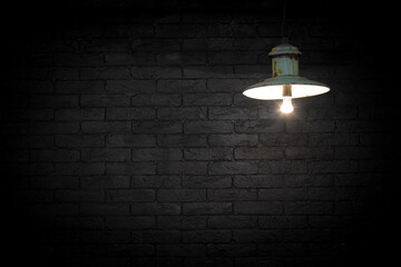 vintage street lamp, black brick wall