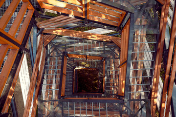 View of a wooden metal stairway from above