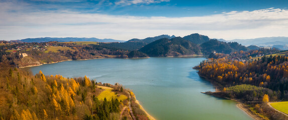 Beautiful landscape of Czorsztyn lake and Pieniny mountains in autumnal colors. Poland