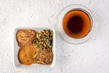 Infusion and ground peruvian medicinal herbs ubos, vilcacora, anona and camu camu